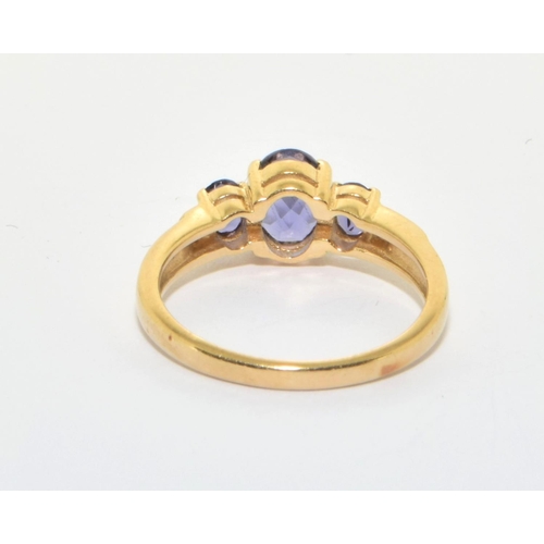 166 - 9ct gold ladies Tanzanite and Diamond ring size L