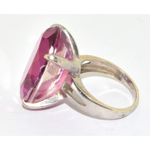 168 - 925 silver ladies Rubellite single stone multi facetted ring in a claw setting size N