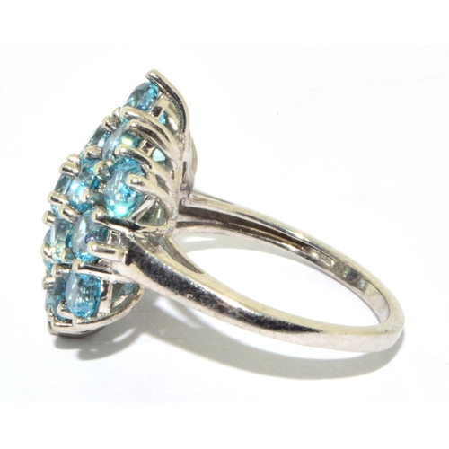 98 - 925 silver ladies diamond shape blue stone statement in an open claw setting  ring size O