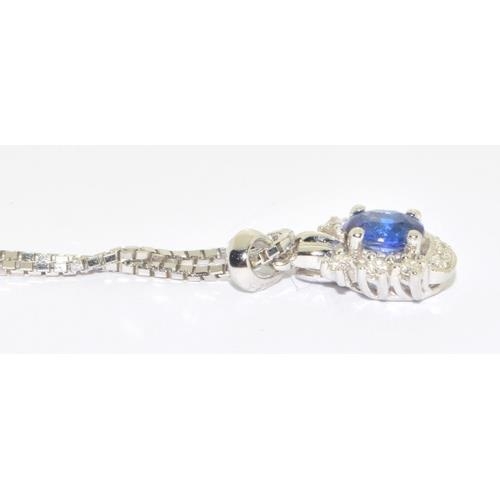 221 - 18ct white gold Diamond and Sapphire pendant necklace on a 40cm chain