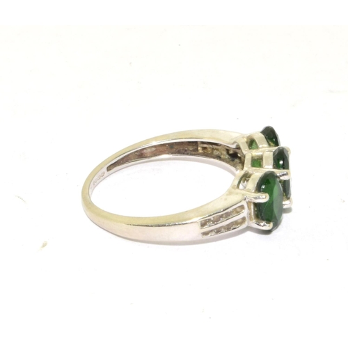 246 - 9ct white gold Emerald and accent Diamond triple stone ring size N