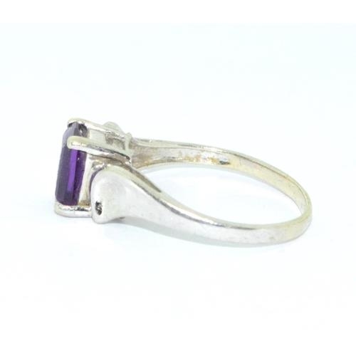 273 - 9ct white gold ladies Amethyst oblong cut solitaire ring size N