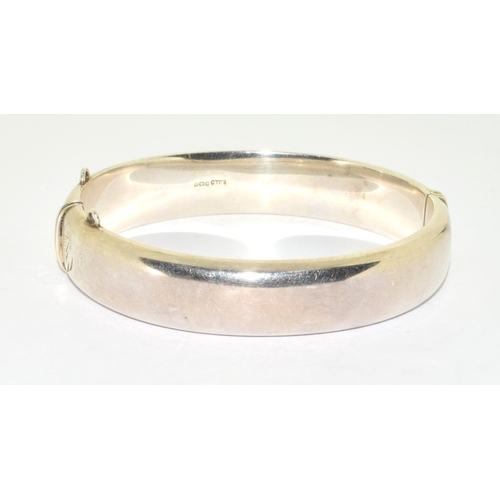 287 - Silver embossed bangle 7cm diameter together a silver clear stone fancy link bracelet 19cm long ... 