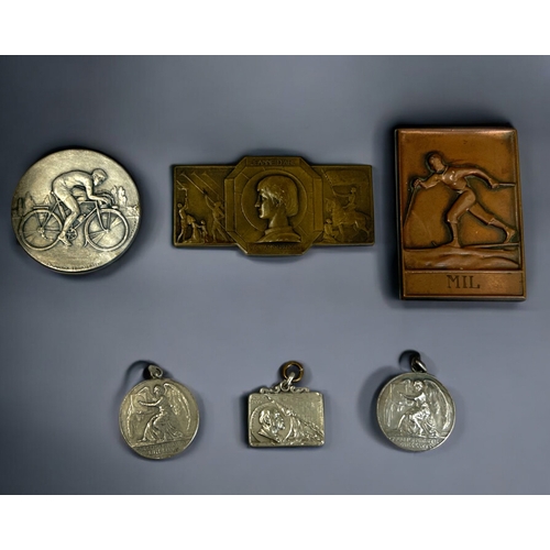 492 - A collection of six medals.Including 1929 Art Deco Jeanne D'Arc - 8 x 4cm