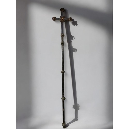 632 - A Bronze processional Cross.Enamelled and adorned with polished Cabochon. Long Ebony handle. Height ... 