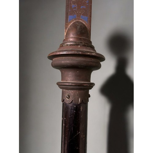 632 - A Bronze processional Cross.Enamelled and adorned with polished Cabochon. Long Ebony handle. Height ... 