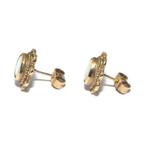 306 - 9ct gold Opal open work set ear studs with scroll fixings