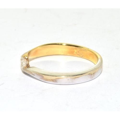 313 - A 14ct white and yellow Gold & Diamond solitaire ring.Size - NWeight - 3.39