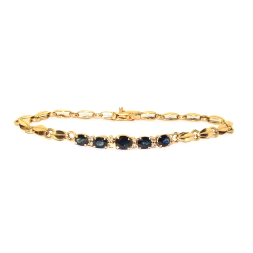 373 - 9ct gold ladies Diamond and Sapphire fancy bracelet 18cm long 7.7grm 