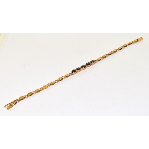 373 - 9ct gold ladies Diamond and Sapphire fancy bracelet 18cm long 7.7grm 