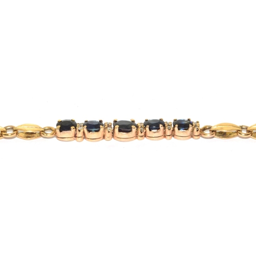 373 - 9ct gold ladies Diamond and Sapphire fancy bracelet 18cm long 7.7grm 