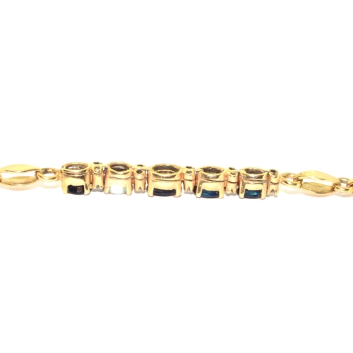 373 - 9ct gold ladies Diamond and Sapphire fancy bracelet 18cm long 7.7grm 