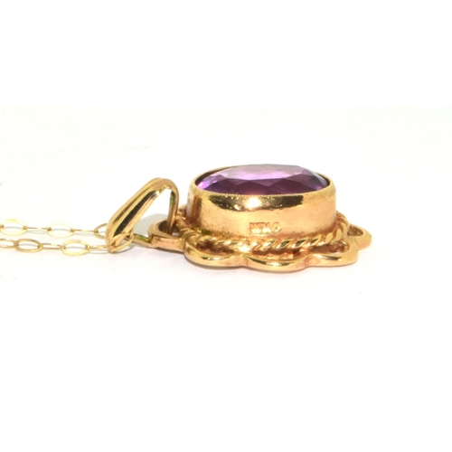 333 - 9ct gold ladies Vintage Amethyst cabochon  pendant necklace in an enclosed setting with open wo... 