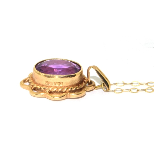 333 - 9ct gold ladies Vintage Amethyst cabochon  pendant necklace in an enclosed setting with open wo... 