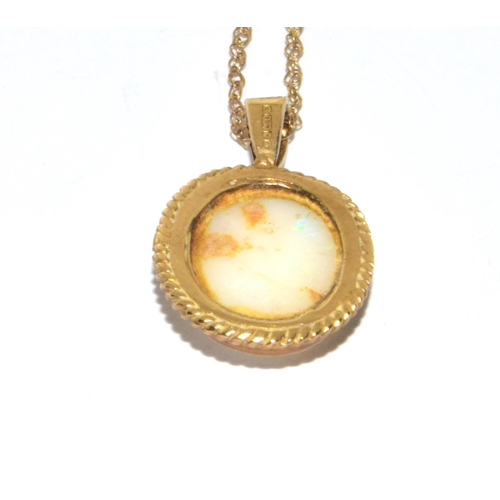 358 - 9ct gold large Opal oval pendant necklace set in a scroll setting on a 46cm gold chain 