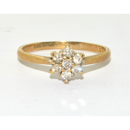 368 - 9ct gold ladies Diamond daisy ring hallmarked in ring as 0.33ct size Q