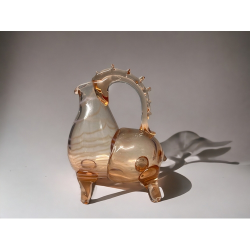 11 - A MID CENTURY USSR ART GLASS BULL CARAFE. Hand blown, with opaline trails. Unmarked. 21 x 16cm