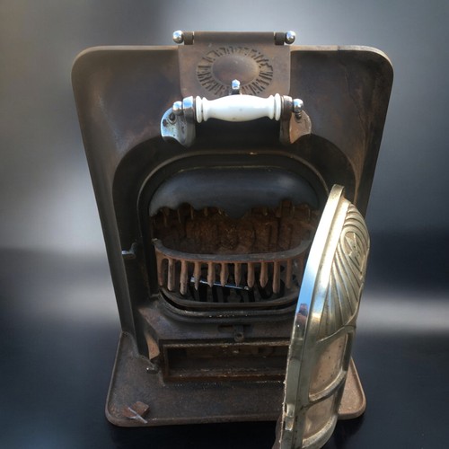 422 - Vintage French Arthur Martin Radiant Cast Iron Wood Burning Stove. Chrome and Ceramic detail. H 67cm... 