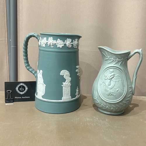 100 - Antique Wedgwood Style Jasperware jug features classical figures in blue with white relief. It is ma... 