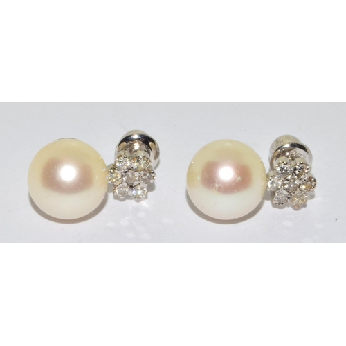 390 - Pair 18ct white gold Diamond cluster and a large natural cultured Pearl earrings 