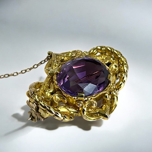 5 - Antique yellow gold & Amethyst brooch.Probably Austrian / German.Rococo setting with large set A... 