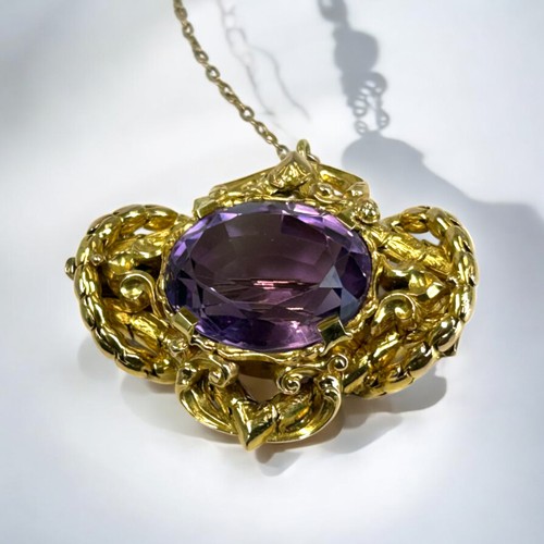 5 - Antique yellow gold & Amethyst brooch.Probably Austrian / German.Rococo setting with large set A... 