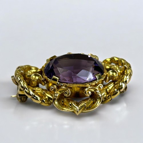 5 - Antique yellow gold & Amethyst brooch.Probably Austrian / German.Rococo setting with large set A... 