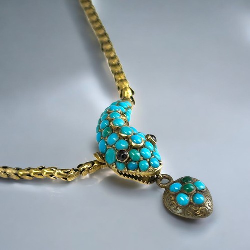 20 - A fine Victorian Gold, Turquoise & Garnet 'Snake' necklace.Circa 1880.Unmarked but tests as 14ct... 