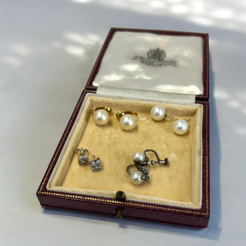 25 - A collection of vintage pearl earrings.Including A pair of silver Pandora earrings.