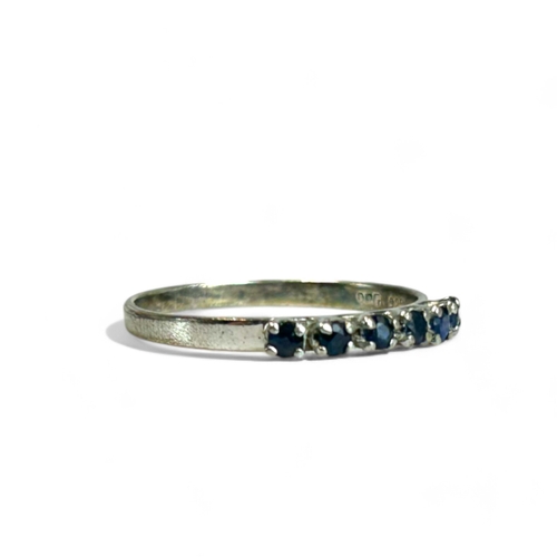 35 - A sterling silver & Sapphire set ring.Size - P/Q.