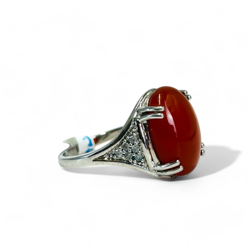 170 - A large silver & Carnelian ring.Size - R