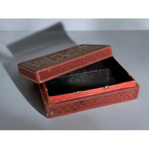 31 - A 19th century Chinese cinnabar lidded box.Together with a gilded lacquer twin-division tea caddy.... 