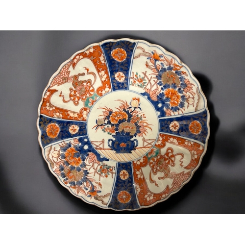 128 - A large pair of Japanese Imari porcelain dishes.Meiji period, 19th century. approx 31cm