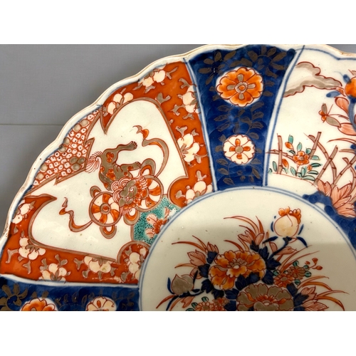 128 - A large pair of Japanese Imari porcelain dishes.Meiji period, 19th century. approx 31cm