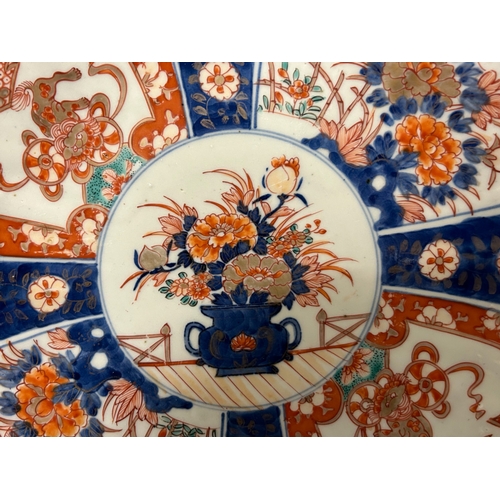 128 - A large pair of Japanese Imari porcelain dishes.Meiji period, 19th century. approx 31cm