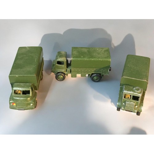 96 - Vintage Dinky Army trucks and an Alvis Scorpion together with 2 other Metal later tanks.