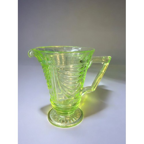 93 - Uranium Glass items and an Art Deco Josef Inwald Dolphin. Largest 16cm x 19cm 3 x Jugs and a Vase.