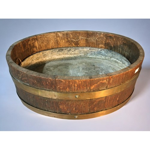 398 - Early 20th Century Brass and Oak Coopered Planter of Ovoid form with Galvanised Original liner.L 45c... 