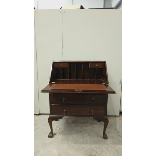 146 - Antique mahogany fold-top desk with brass hardware, claw-foot legs, and internal compartments.