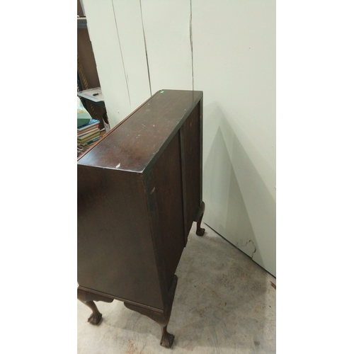 146 - Antique mahogany fold-top desk with brass hardware, claw-foot legs, and internal compartments.