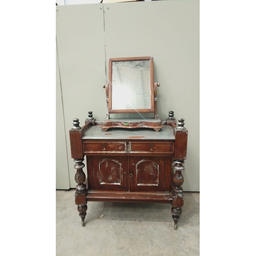 147 - Victorian mahogany side table with swivel mirror and intricate turned legs, featuring two drawers an... 