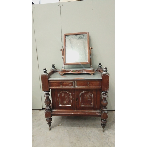 147 - Victorian mahogany side table with swivel mirror and intricate turned legs, featuring two drawers an... 