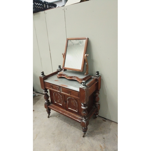 147 - Victorian mahogany side table with swivel mirror and intricate turned legs, featuring two drawers an... 