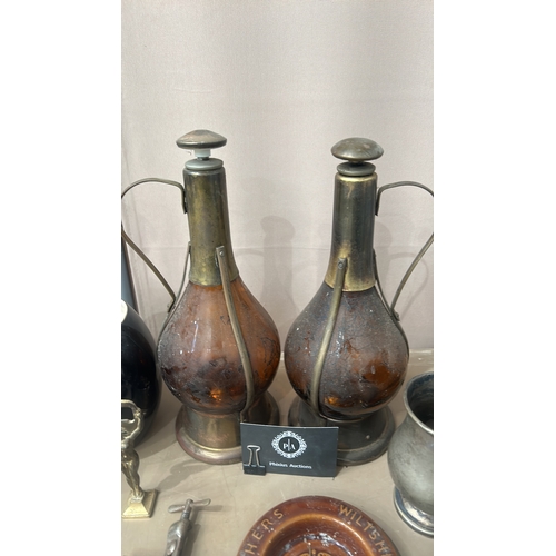 162 - Mixed lot featuring vintage glass bottles, ceramic steins, pewter cup, crystal decanters, and cerami... 