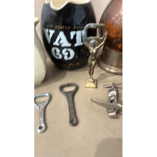 162 - Mixed lot featuring vintage glass bottles, ceramic steins, pewter cup, crystal decanters, and cerami... 