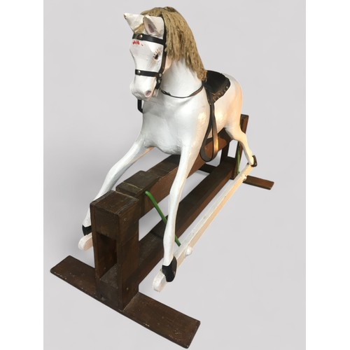 21 - Vintage White Carved Wooden Swinging Rocking Horse.H 84cm (to Saddle 65cm)L 114cm