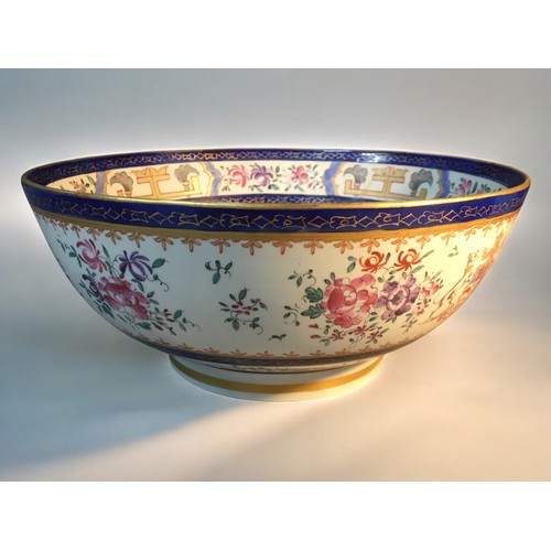 161 - A Large Footed Samson Armorial Centre Bowl. Gilt Flower and Blue Decoration.Dia 28.5cm H 12cm