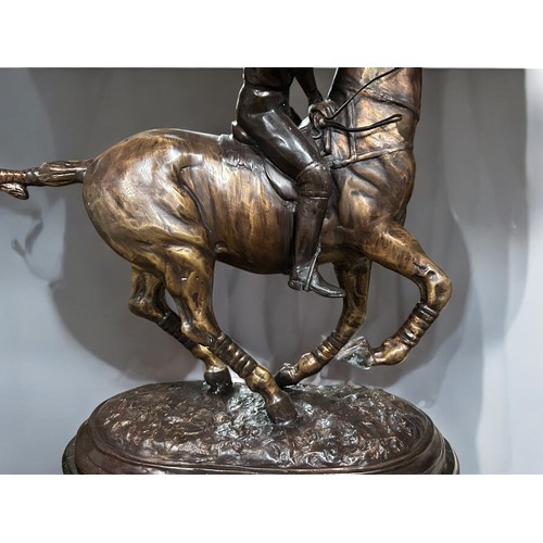 331 - A large Bronze figure of Polo player.20th century.Traditional lost wax cast.Height: 25.99 in (66 cm)... 