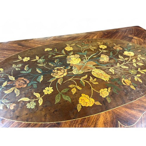 283 - A 19th century French Ormolu mounted Kingswood games table. Marquetry inlaid with foliate design and... 