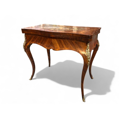 283 - A 19th century French Ormolu mounted Kingswood games table. Marquetry inlaid with foliate design and... 